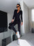 Dames sportieve jumpsuit activewear met lange mouwen en rits - strak zwart casual of workout outfit