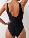 Badmode - elegante dames eendelig met contrastdetails