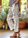 Witte bloemenprint broeken - stijlvolle bloemenpatroon pants voor dames
