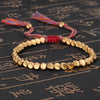 Tibetaans boeddhistische harmonie armband - elegante gouden damesarmband - Bakkermode.nl