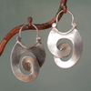 2-delige damesoorbellen vintage zilveren spiraalontwerp - elegante hoops voor casual en avondkleding