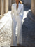 Dames tailored jumpsuit met riem in elegant wit - chique kantoorkleding voor verfijnde evenementen