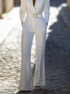 Dames tailored jumpsuit met riem in elegant wit - chique kantoorkleding voor verfijnde evenementen