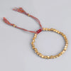 Tibetaans boeddhistische harmonie armband - elegante gouden damesarmband - Bakkermode.nl