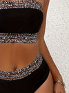 2-delige dames bandeau bikini set in zwart met luipaardprint afwerking - trendy strandmode voor de zomer