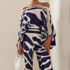 2-delige satijnen set - elegante off-shoulder top en wijde pantalon