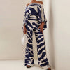 2-delige satijnen set - elegante off-shoulder top en wijde pantalon