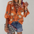Bloemen blouse met knopen - elegante dames top voor casual gelegenheid