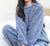2-delig dames pyjamaset van fleece - zachte en warme loungewear voor koude avonden - Bakkermode.nl