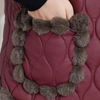 Gequiltte vest - stijlvolle gewatteerde damesgilet met pomponrand