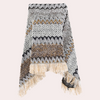 Gebreide poncho - stijlvolle dameswrap met franjes