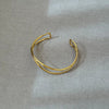 Vrouwen gouden cuff bracelet - stijlvolle open accessoire voor avondkleding
