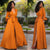 Elegante oranje zomerjurk - verfijnde damesmode