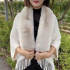 Luxe gebreide poncho met nepbont kraag - elegante wintermode voor dames