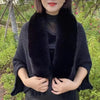 Luxe gebreide poncho met nepbont kraag - elegante wintermode voor dames
