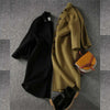 Lange knopencoat - elegante, getailleerde damesouterwear