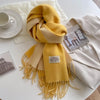 Luxe wollen sjaal - zachte dames wrap met franjes - Bakkermode.nl