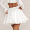 Uitlopende high-waist mini rok - Bakkermode.nl