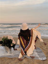 Witte gebreide poncho - stijlvolle dames wrap met patroon