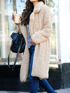 Lange imitatiebont jas - luxe dames outerwear - Bakkermode.nl