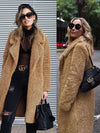Lange imitatiebont jas - luxe dames outerwear - Bakkermode.nl