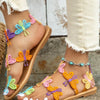 Platte sandalen met kleurrijke vlinderdecoratie - Bakkermode.nl
