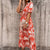 Bloemen maxi jurk - elegante dames zomerjurk met gaatje aan de zijkant