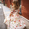 Zomer maxi jurk met elegante bloemenprint en ceintuur - voor feestelijke gelegenheden