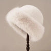 Imitatiebont muts - luxe winter dames hoofddeksel - Bakkermode.nl