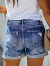 Gescheurde denim shorts met knoopsluiting - Bakkermode.nl