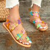 Platte sandalen met kleurrijke vlinderdecoratie - Bakkermode.nl