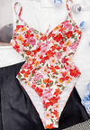 Bloemenbadpak met diepe hals en open rug - Bakkermode.nl