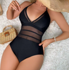 Zwart badpak met mesh details en open rug - Bakkermode.nl