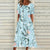 Bloemen midi-jurk - levendige dames jurk met bloemenprint