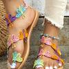 Platte sandalen met kleurrijke vlinderdecoratie - Bakkermode.nl