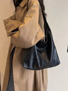 Minimalistische schoudertas dames - stijlvolle leren tas - Bakkermode.nl