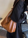 Minimalistische schoudertas dames - stijlvolle leren tas - Bakkermode.nl