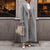 Oversized jas - luxueuze lange wikkeljas voor dames