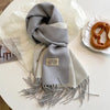 Luxe wollen sjaal - zachte dames wrap met franjes - Bakkermode.nl