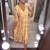 Dames bohemian maxi jurk met vloeiende lange mouwen - chic v-hals ontwerp voor tuinfeesten