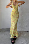 Vrouwelijke bloemen maxi jurk in geel - luchtige zomerse outfit met ronde hals