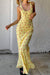Vrouwelijke bloemen maxi jurk in geel - luchtige zomerse outfit met ronde hals