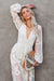 Elegante kanten maxi jurk voor dames - bohemian avondmode met doorschijnende lange mouwen en hoge split