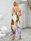Dames beige bloemen jumpsuit - elegante halternekstijl voor zomerse uitjes