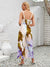 Dames beige bloemen jumpsuit - elegante halternekstijl voor zomerse uitjes