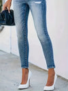 Hoge taille skinny jeans - chic denim broeken met knopdetail