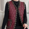 Gequiltte vest - stijlvolle gewatteerde damesgilet met pomponrand