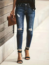 Diepblauwe distressed skinny jeans - trendy dames denimbroek