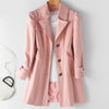 Trenchcoat - elegante dames met dubbele rij knopen