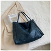 Ruime leren schoudertas - elegante tote voor dames